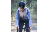 Pale grey deepening to slate grey wind vest with mesh pockets on back